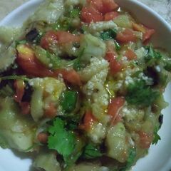 A picture of Begun pora (roasted brinjal).
