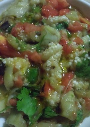 A picture of Begun pora (roasted brinjal).