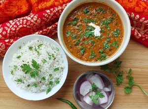 A picture of Dal makhani with jeera rice.
