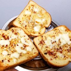 A picture of Cheesy Garlic Bread toast.