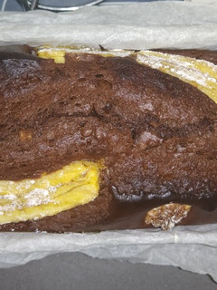 Una foto de Bizcocho de plátano, cacao y nueces en mambo