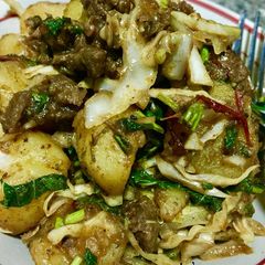 A picture of Potatoes and beef.