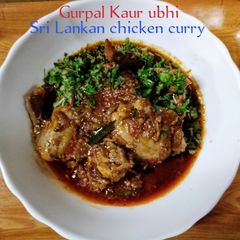 A picture of Sri Lankan chicken curry 🐓🧅🍅.