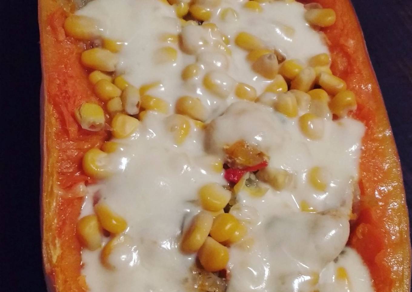 Calabaza rellena con verduras y pollo