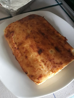 Una foto de Tamal asado