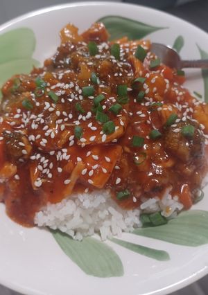 A picture of Sweet & Sour Chicken over Jasmine Rice.