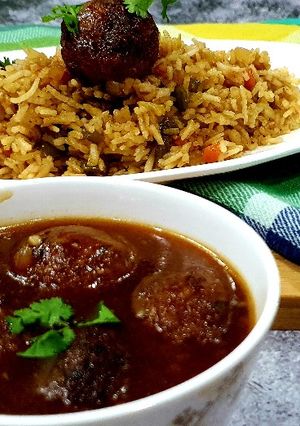 A picture of Non Fried Gravy Manchurian and vegetable Fried Rice.
