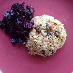A picture of Left-over rice with vegs.