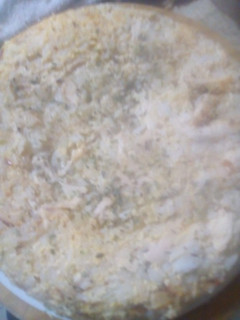 Una foto de Tortilla de pollo, arroz y verdeo