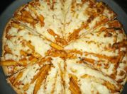A picture of cheesy pizza fries
