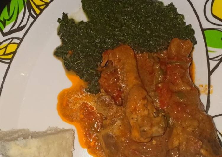 Ugali,chicken stew with greens