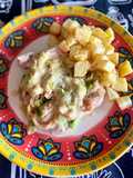 Muslitos de pollo deshuesado con salsa de puerros