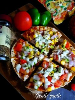 चीज़ बर्स्ट रोटी पिज़्ज़ा(cheese burst roti pizza recipe in hindi) रेसिपी मुख्य फोटो