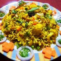 A picture of Veg soya chunk biryani.