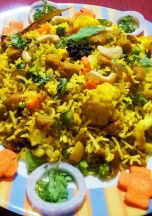 A picture of Veg soya chunk biryani.