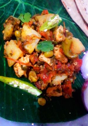 A picture of Mix vegetables with chicken karahi.