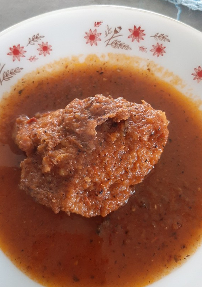 Una foto de Pollo frito en salsa roja