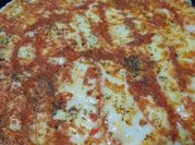 Una foto de salsa para prepizzas