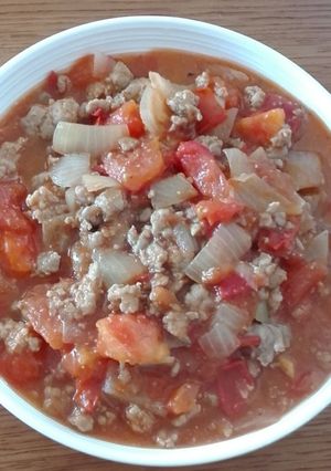A picture of Tomato and Pork in Sauce.