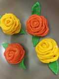 Sweet sesame Rose Pitha