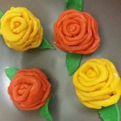 Sweet sesame Rose Pitha A picture of Sweet sesame Rose Pitha.