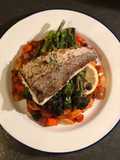 Seared hake. Butterbean, chorizo and olive stew. Purple sprouting broccoli