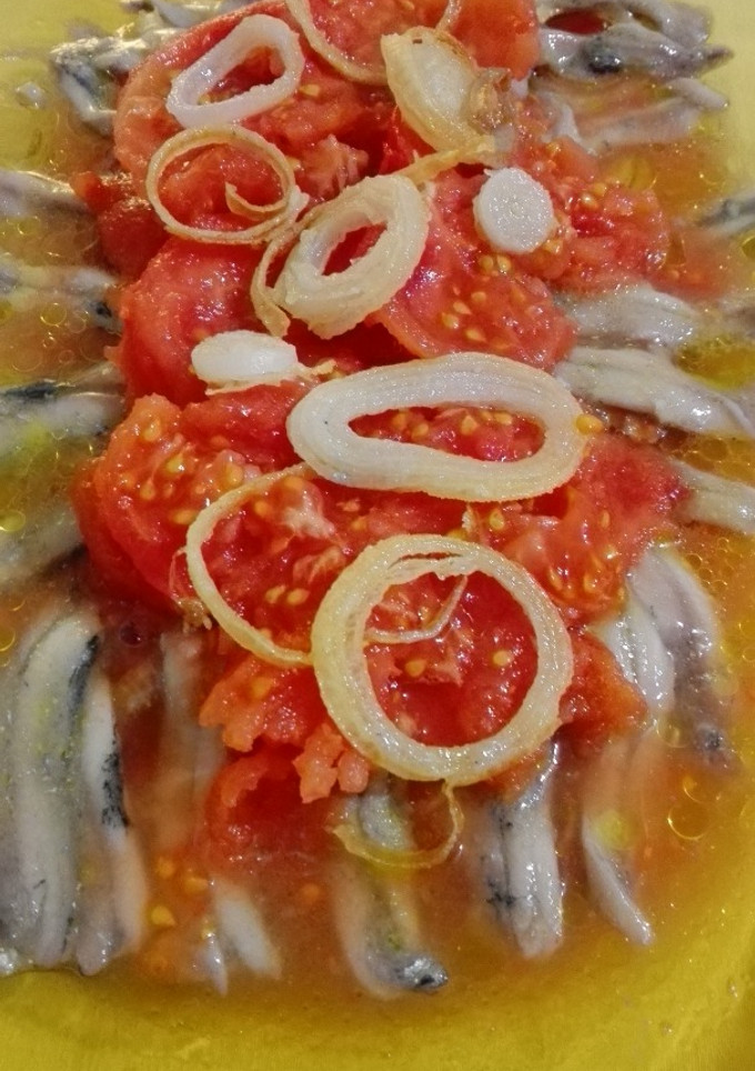 Una foto de Lasaña de tomate y anchoas