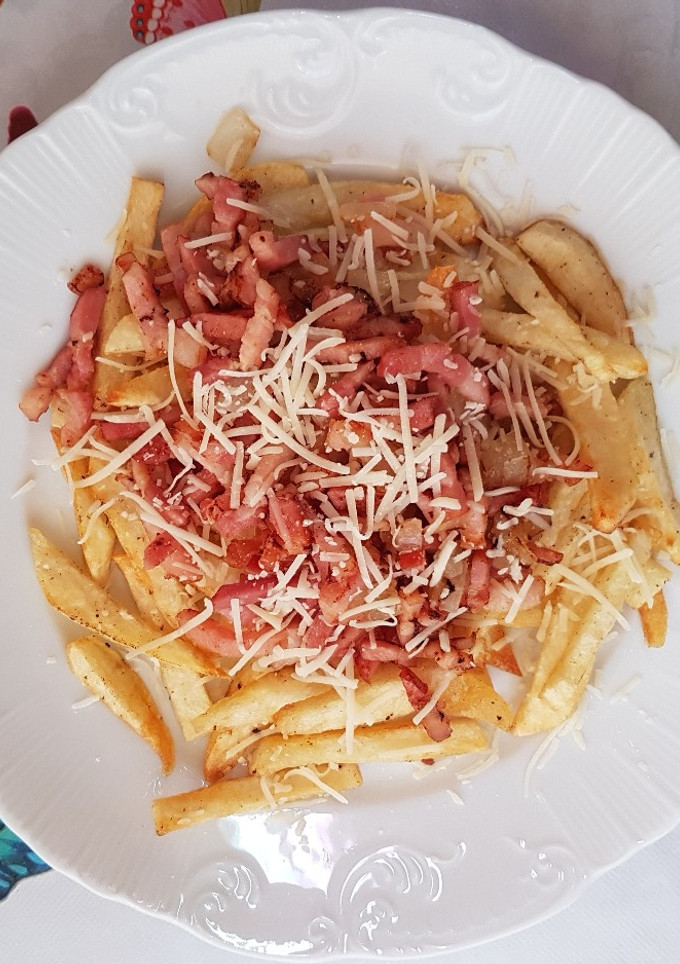 Una foto de Patatas salteadas con bacon y queso