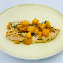 A picture of Chicken breast with mango.