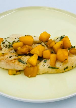 A picture of Chicken breast with mango.