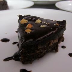 Chocolate fudge with Chocolate sauce and nuts A picture of Chocolate fudge with Chocolate sauce and nuts.