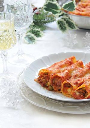 A picture of Cannelloni Stuffed with Meat Ragù and Peas.
