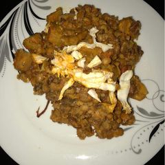 A picture of Unripe plantain with beans.