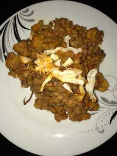 A picture of Unripe plantain with beans.