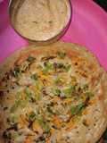 Utappam with loaded vegetables