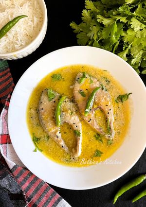 A picture of Ilish Macher Malai Curry (Hilsa Fish in Coconut milk gravy) Bengali lunch.