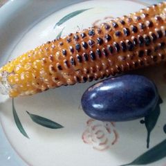 A picture of Grilled corn and African Pear.