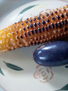 A picture of Grilled corn and African Pear.