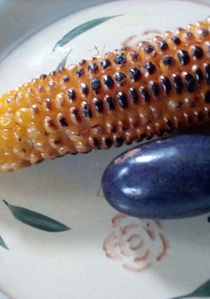 A picture of Grilled corn and African Pear.