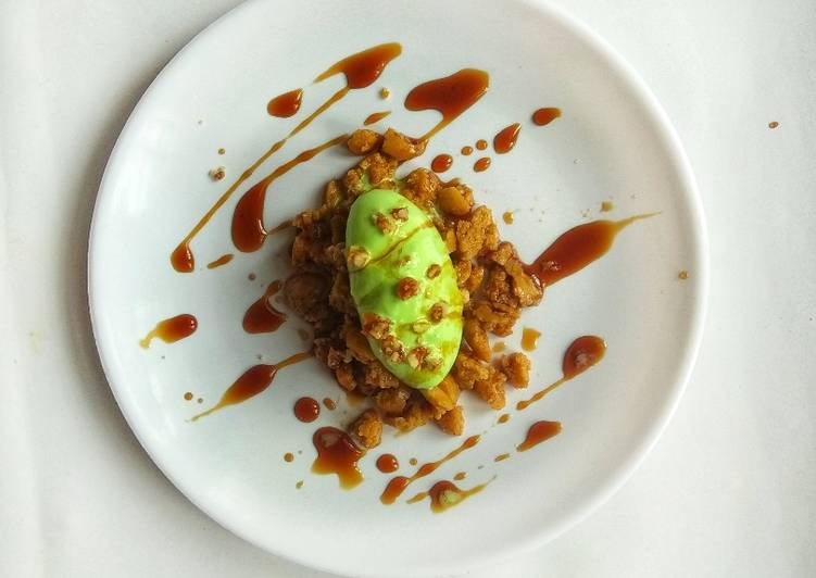 “Coffee infused Rasgulla crumbs with pistachio ice cream and coffee syrup”
