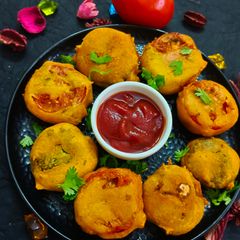 A picture of Thecha Tomato Fritters.
