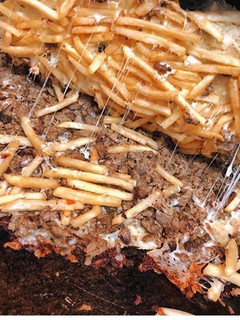 Una foto de Papas cheddar con carne