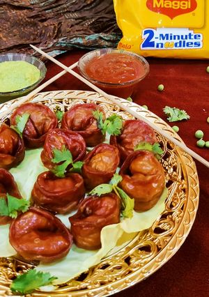 A picture of Red Maggi noodles Momos.