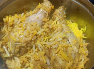 A picture of Hyderabadi chicken biryani.