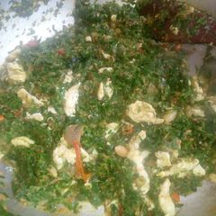 A picture of Chili Scrambled Eggs with Greens and Gravy.