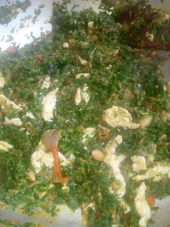 A picture of Chili Scrambled Eggs with Greens and Gravy.