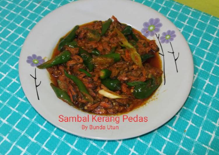 Langkah Mudah untuk Menyiapkan Sambal kerang pedas yang Menggugah Selera