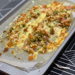 A picture of White Fish Fillet with Salsa and Cheese.