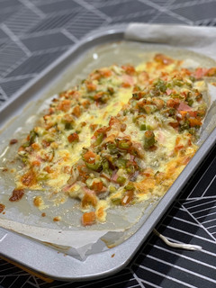 A picture of White Fish Fillet with Salsa and Cheese.