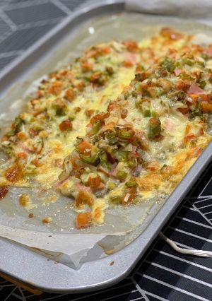 A picture of White Fish Fillet with Salsa and Cheese.